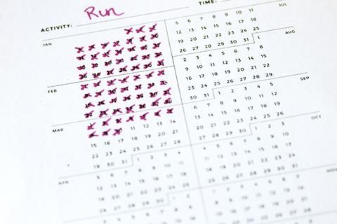 Calendrier de l'année complète sur une seule page avec une croix pour chaque où une activité (ici le running) est réalisée